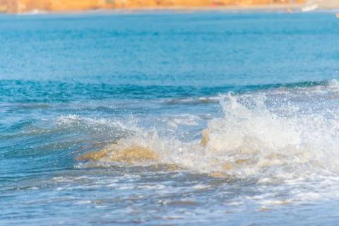 Waves on the beach Stock Photos