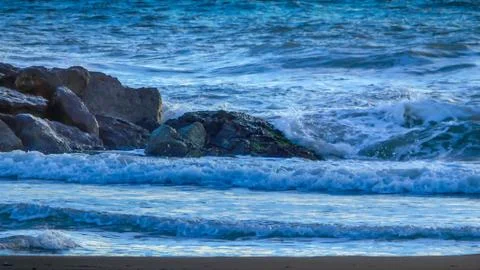 Waves on the beach Stock Photos