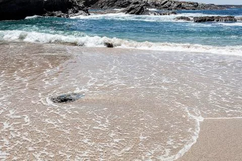 Waves at the beach. Stock Photos