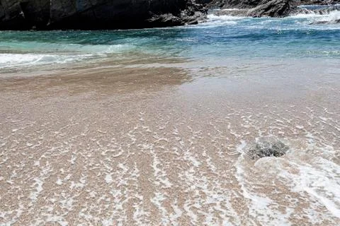 Waves at the beach. Stock Photos