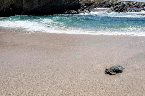Waves at the beach. Stock Photos