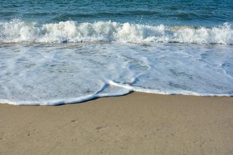 Waves on the beach Stock Photos