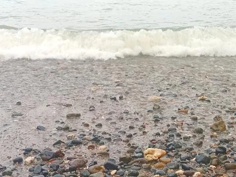 Waves on the beach Stock Photos