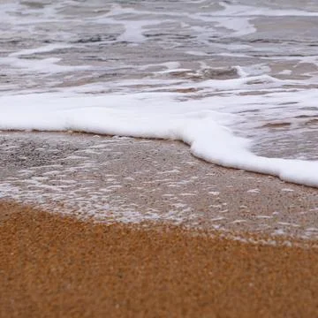 Waves on the beach Stock Photos