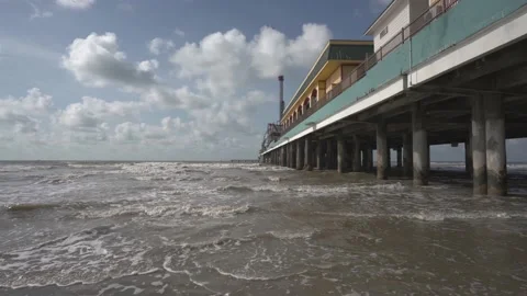 Waves On Beach Pier in Texas on Sunny Day Stock Footage 201314056