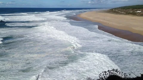 Waves at the beach of Praia do Norte, Nazare (Portugal) Stock Footage 58306541
