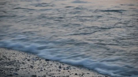 Waves on the beach rack focus - real time footage Stock Footage 83205358