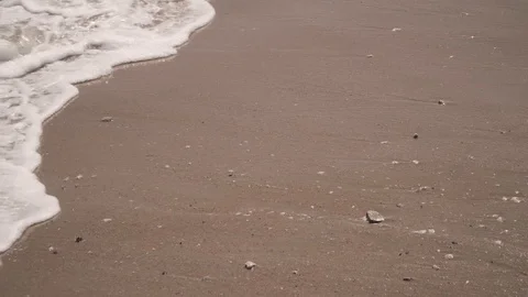 The waves of a beach of the river Douro on the coast of the city of Lisbon. Stock Footage 91359738
