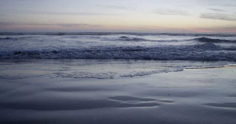 Waves on beach rush in slow motion sunset landscape water ocean Stock-Footage 67821926