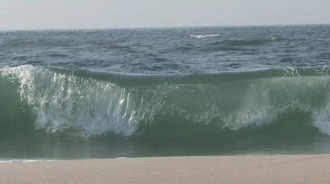 Waves on beach in slow motion Stock Footage 719452