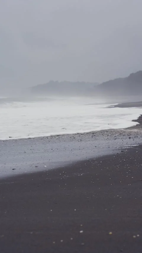Waves by the beach on a stormy day. West Coast, New Zealand Stock Footage 290968057