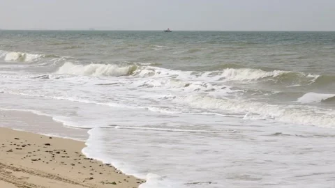  waves on the beach with sunlight Video stock 303883701