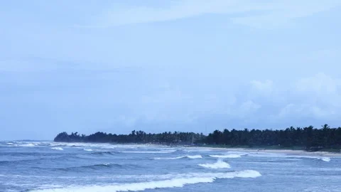 Waves in beach on sunny day Stock Footage 292224006
