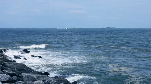 Waves in beach on sunny day Stock Footage 292224340