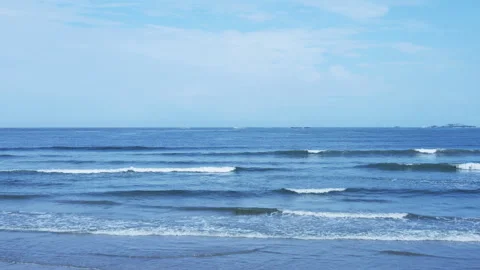 Waves in beach on sunny day Stock Footage 292234072