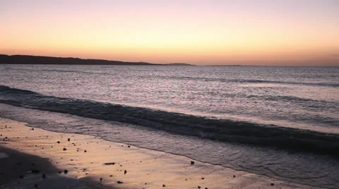 Waves on a beach at sunrise, Hurghada, Egypt Stock Footage 37811896