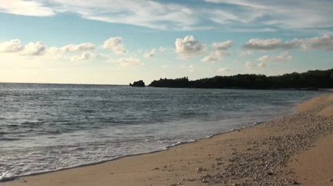 Waves on a beach of a tropical island Stock Footage 44398167