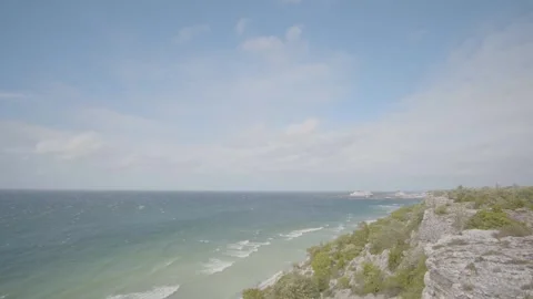 Waves on the beach with a view from a cliff Stock Footage 258172469