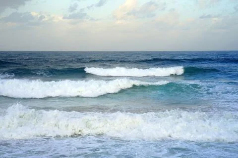 Waves on the beach in windy weather Stock Photos