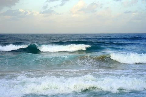 Waves on the beach in windy weather Stock Photos
