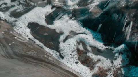 Waves beat against the rocks clouseup Stock-Footage 94928587