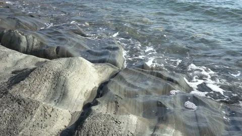 Waves beat against the rocks Stock Footage 94901227