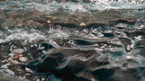 Waves beat against the rocks Video stock 94929859