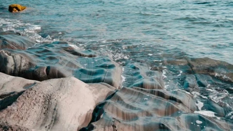 Waves beat against the rocks Stock Footage 94929945