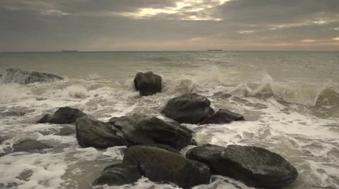 The waves beat against the rocks. Slow motion. Stock Footage 52669651