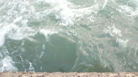 Waves beat against the shore Stock Footage 10564309