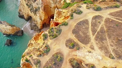 The waves beat on the cliff top view Stock Footage 64968355