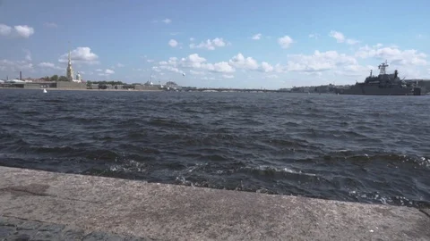 Waves beat on the stone steps of the city promenade Stock Footage 108305318
