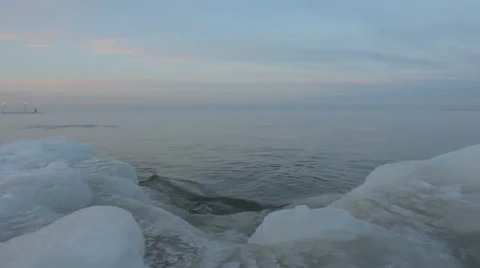 The waves beating against the cold shore Stock-Footage 58972795