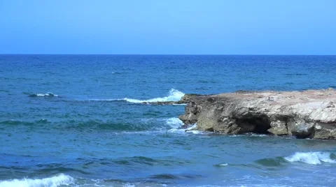 Waves Beating Against The Rocks. 4K Video stock 64801414