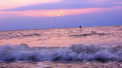 Waves beating against the shore during dramatic sunset. HD. 1920x1080 Stock Footage 47083563
