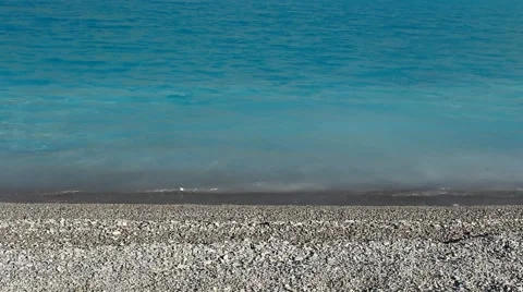 The waves beating against the shore Vídeo Stock 68643835