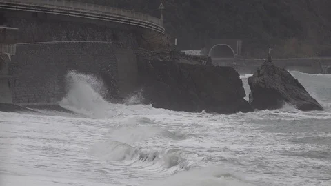 Waves beating on the rock wall Stock Footage 104496688