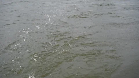 Waves behind a boat on the river Stock Footage 306173680