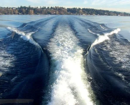 Waves behind the fast boat Stock Photos