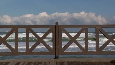 Waves behind the wide window Video stock 147490338