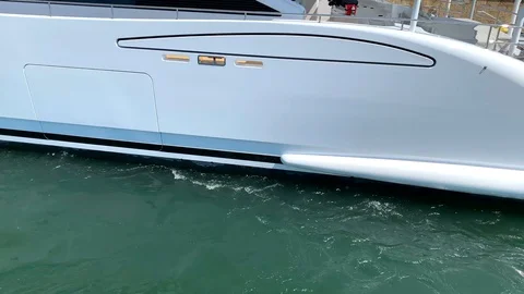 The waves behind the yacht Stock Footage 112024946