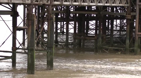 Waves beneath seaside pier Stock Footage 47108742