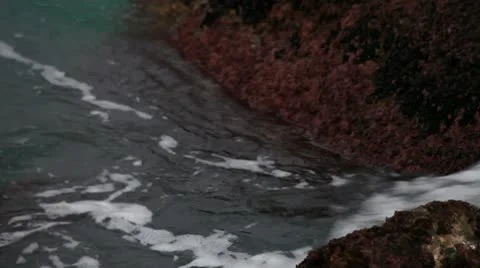 Waves between marine rocks Stock Footage 10593216