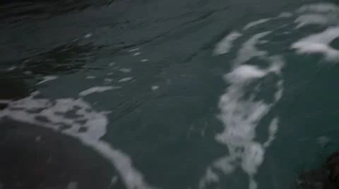 Waves between marine rocks Stock Footage 10593236