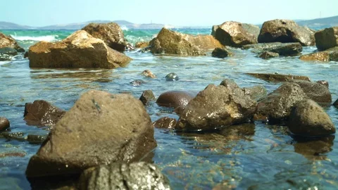 Waves between stones at sea 動画素材 113456067