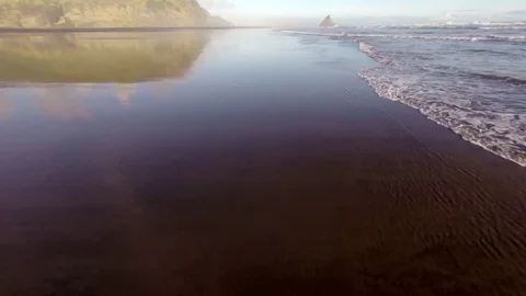 Waves in Black Sand Beach Stock Footage 76893699
