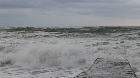 Waves of the Black sea during a storm crashing against the breakwater. Sochi Vidéo 48981328