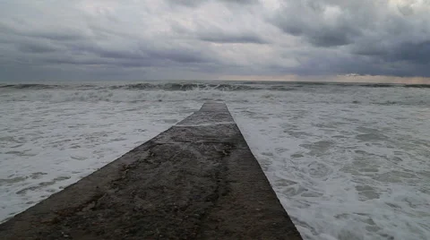 Waves of the Black sea during a storm crashing against the breakwater. Sochi Vidéo 48982167