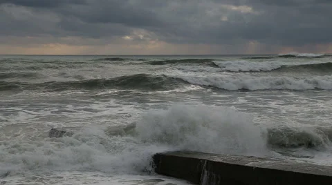 Waves of the Black sea during a storm breaking on the pier in Sochi Vidéo 48988162