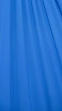 Waves on a Blue fabric Stock Photos